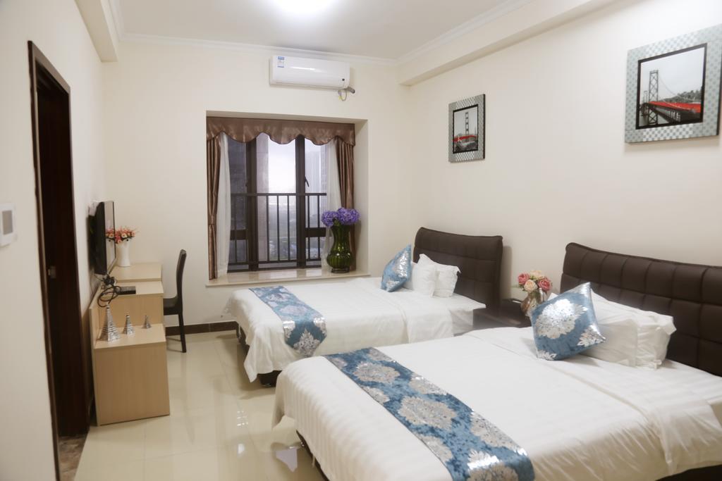 Guangzhou Yi Long International Apartment Quarto foto
