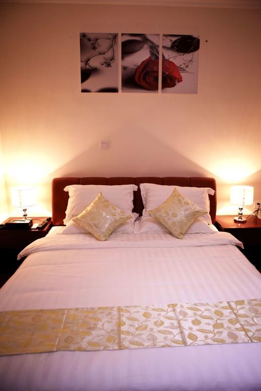 Guangzhou Yi Long International Apartment Quarto foto